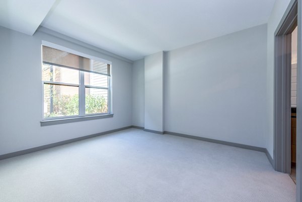 Comfortable bedroom with cozy decor at Marlow Apartments