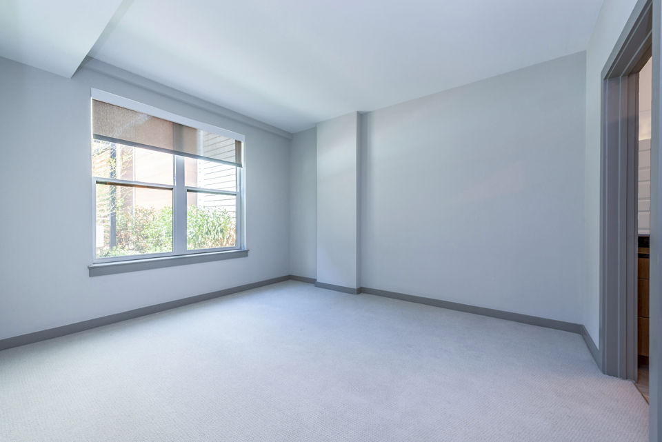 Comfortable bedroom with cozy decor at Marlow Apartments