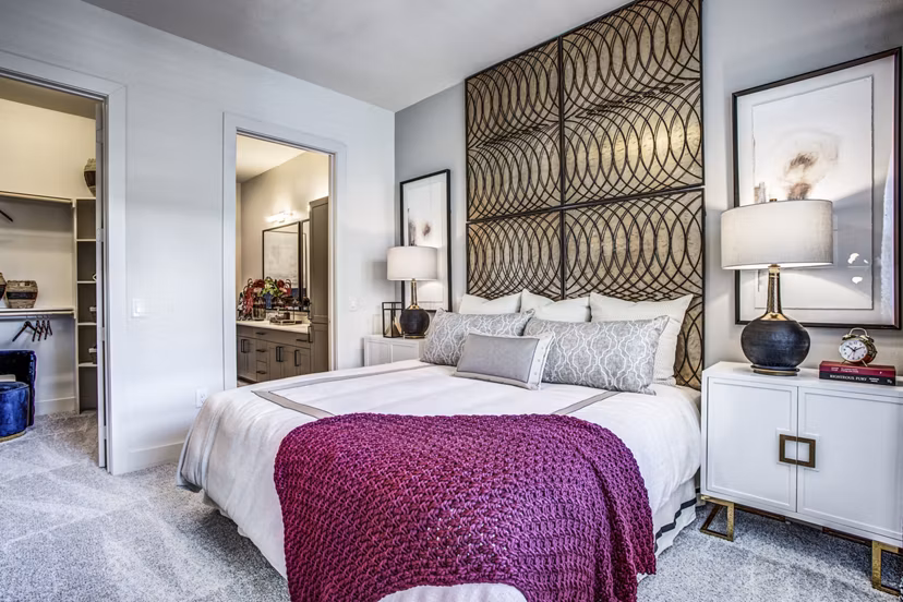 Modern bedroom with stylish decor at Bluffs at Midway Hollow Apartments