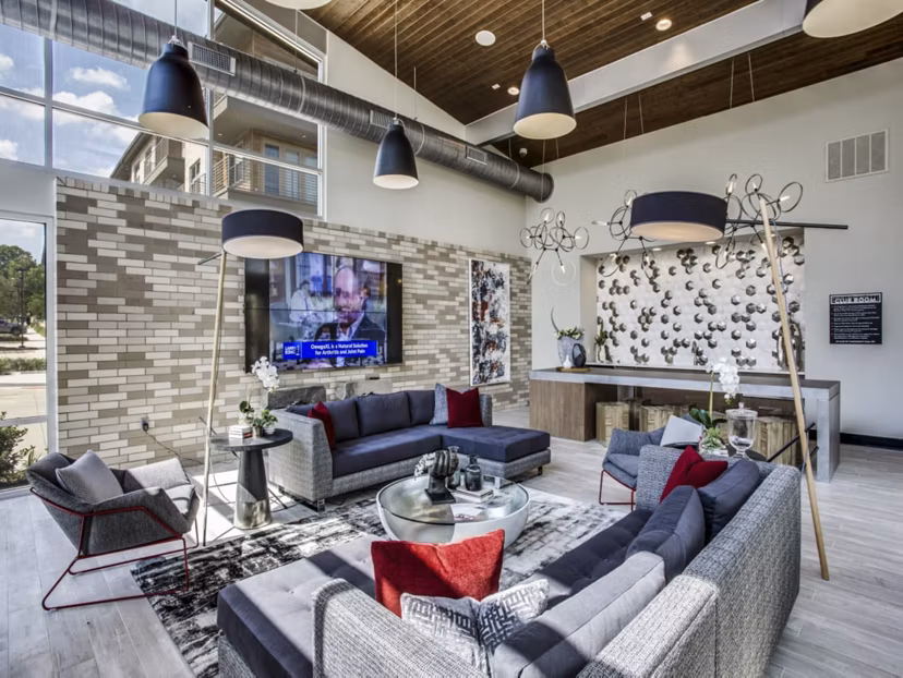 Modern clubhouse featuring elegant seating areas at Bluffs at Midway Hollow Apartments