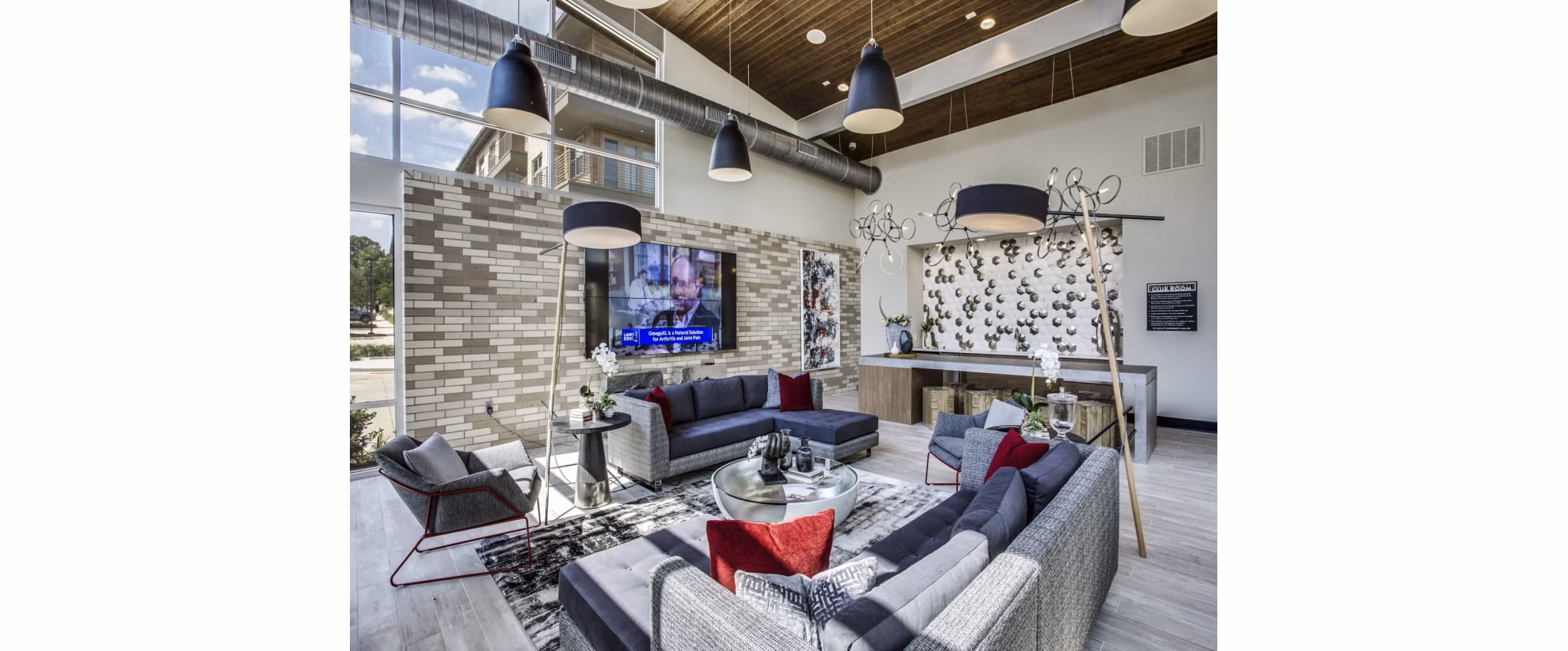 Modern clubhouse featuring elegant seating areas at Bluffs at Midway Hollow Apartments