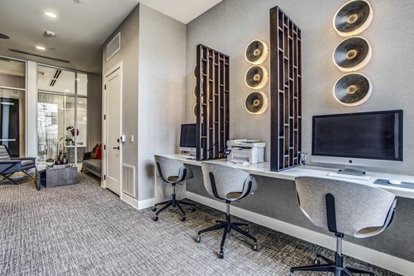 Elegant clubhouse with modern dÃ©cor at Bluffs at Midway Hollow Apartments
