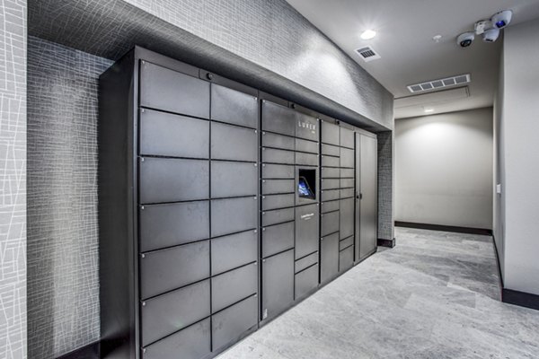 Secure parcel pickup lockers at Bluffs at Midway Hollow Apartments for convenient package retrieval