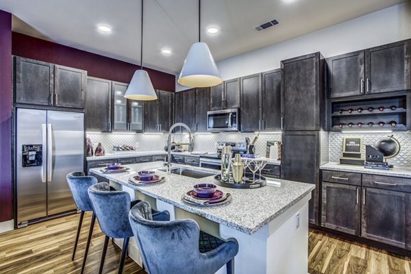 Spacious kitchen with modern appliances at Bluffs at Midway Hollow Apartments