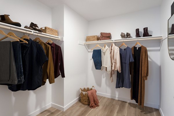 Spacious closet with ample shelving in The Louise 4900 Apartments, Greystar luxury living