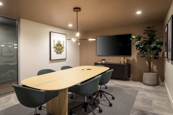 Modern meeting facility with sleek design at The Louise 4900 Apartments