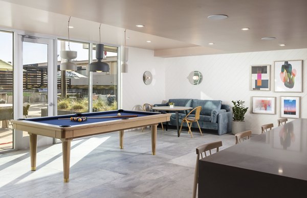 The Louise 4900 Apartments: Modern clubhouse with sleek design and community spaces