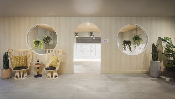 Contemporary clubhouse with stylish seating areas at The Louise 4900 Apartments