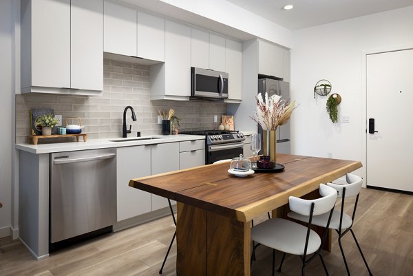 Spacious kitchen with modern appliances at The Louise 4900 Apartments