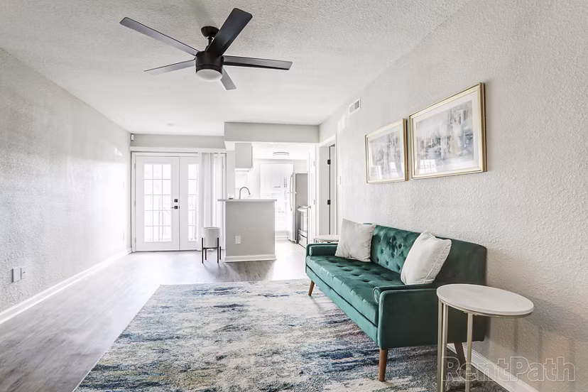 Living room featuring modern design and natural light at The Lumiere Apartments, luxury living in the heart of the city