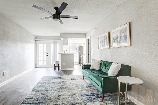 Living room featuring modern design and natural light at The Lumiere Apartments, luxury living in the heart of the city