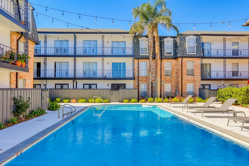 Modern high-rise The Lumiere Apartments in Metairie, LA, featuring luxury living options and distinctive architecture