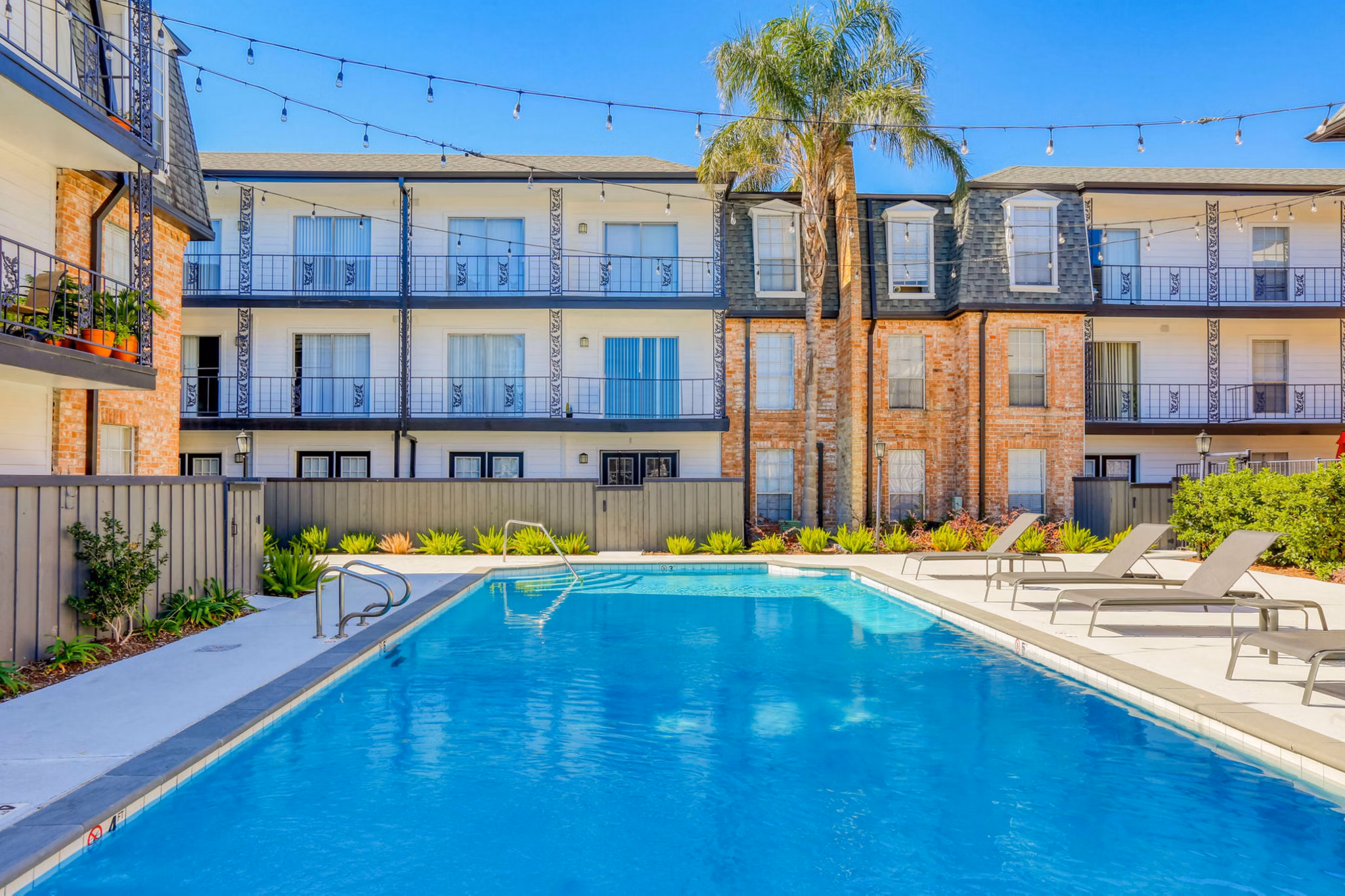 Modern high-rise The Lumiere Apartments in Metairie, LA, featuring luxury living options and distinctive architecture