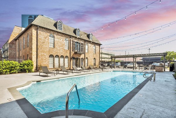 Rooftop pool with city views at The Lumiere Apartments
