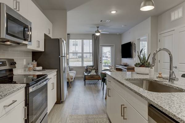 kitchen and laundry area at Estraya Boerne Apartments