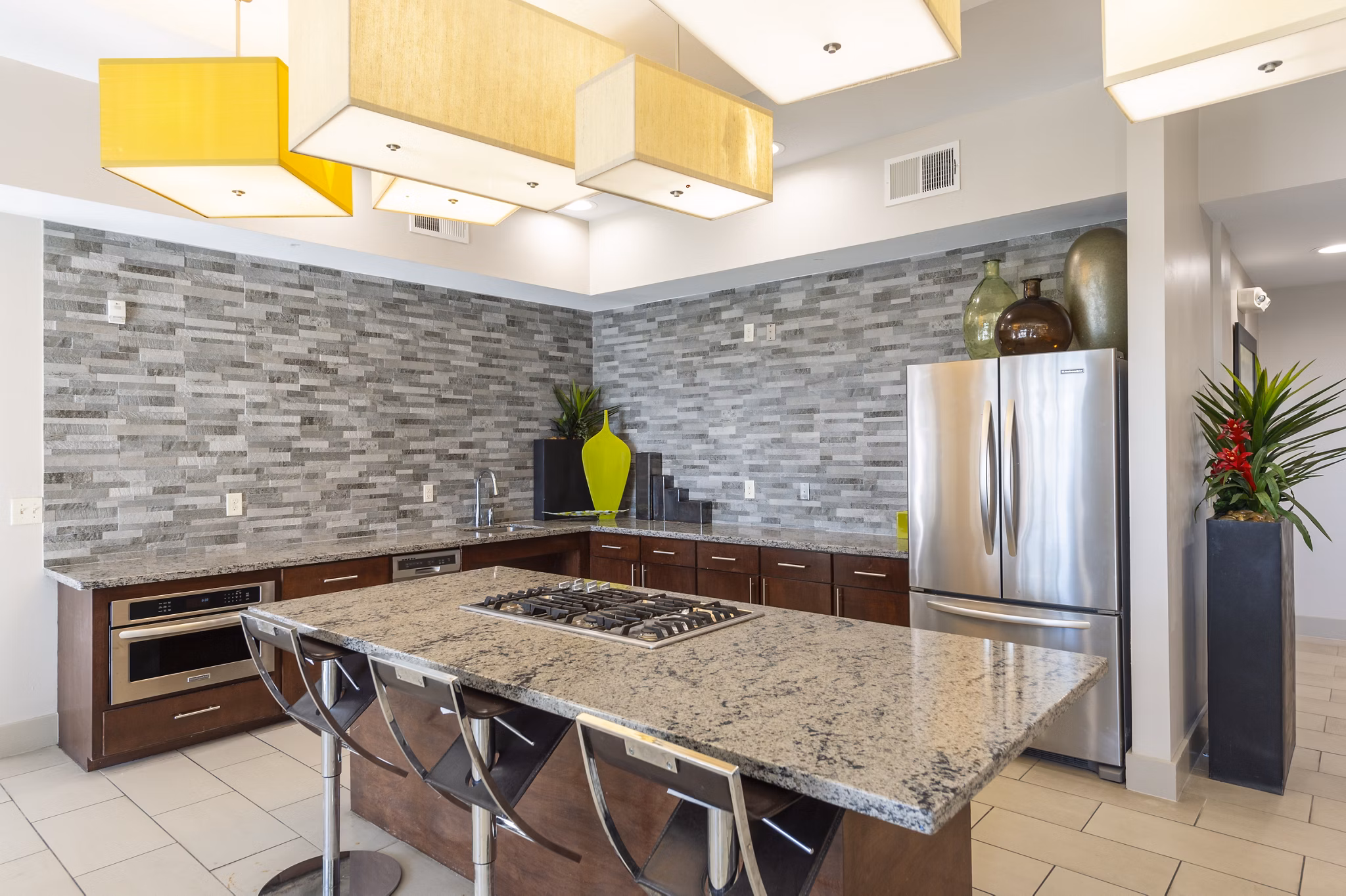 Clubhouse with modern design and seating at Regard at Med Center Apartments
