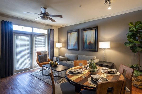 Luxurious living room with elegant decor in Regard at Med Center Apartments