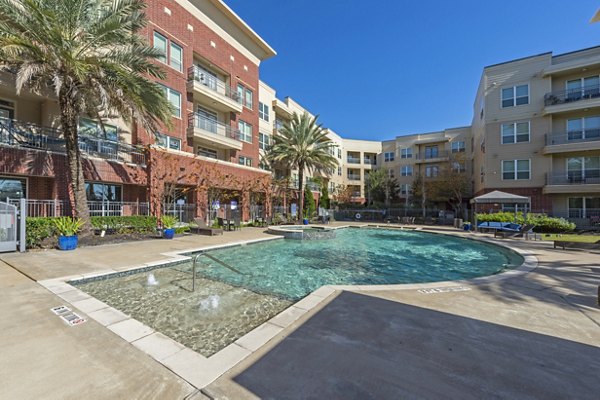 Luxurious pool at Regard at Med Center Apartments offering relaxation and stunning outdoor views