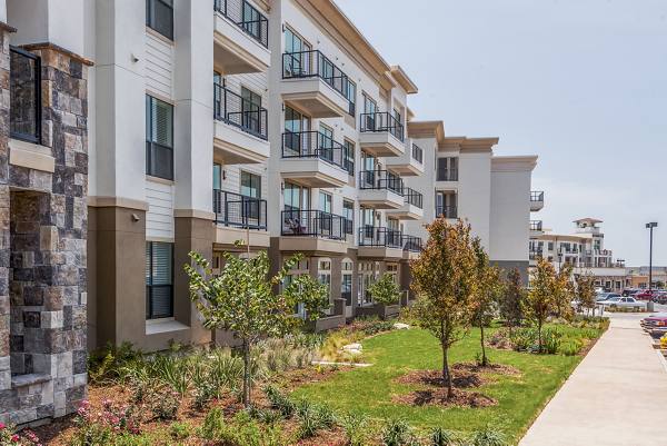 building/exterior at Tribute at the Rim Apartments
