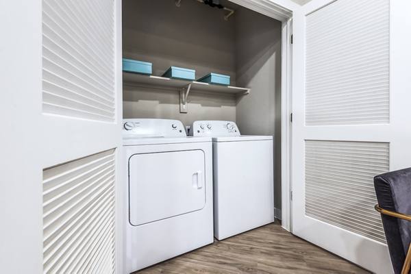 laundry room at Tribute at the Rim Apartments