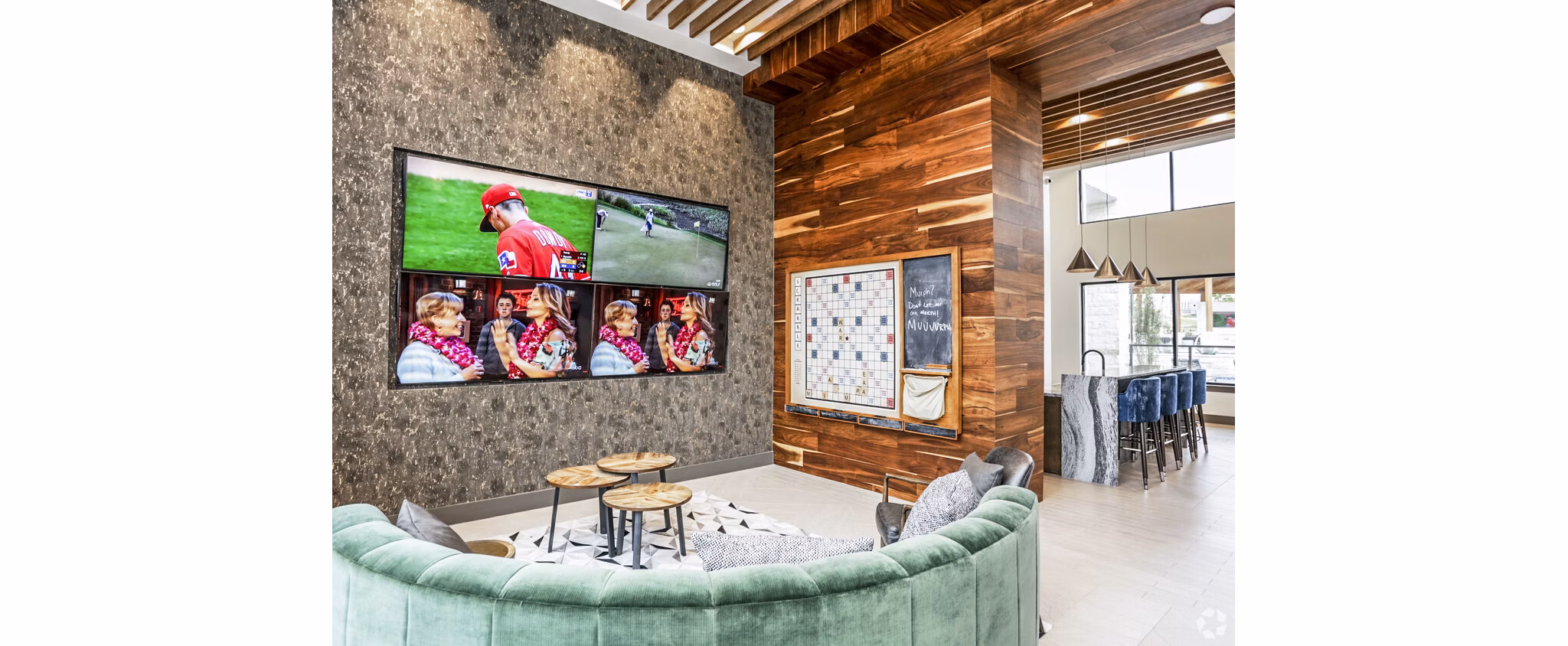 Modern clubhouse with comfortable seating and pool table at TruNorth at Bulverde Apartments