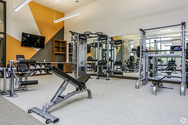 State-of-the-art fitness center with modern equipment at TruNorth at Bulverde Apartments in San Antonio