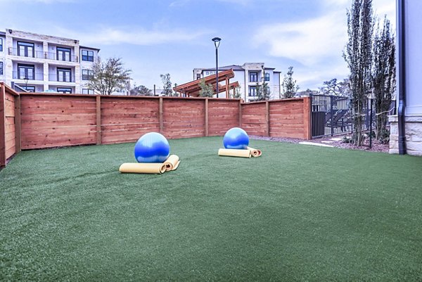 Recreational area with green spaces at TruNorth at Bulverde Apartments