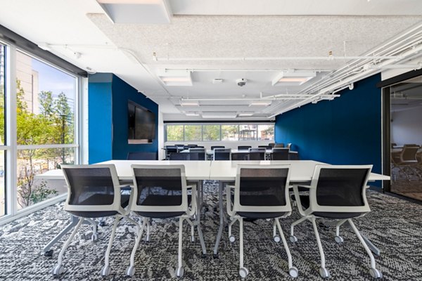 Meeting facility featuring modern design and conference seating at The Accolade on Chestnut Apartments