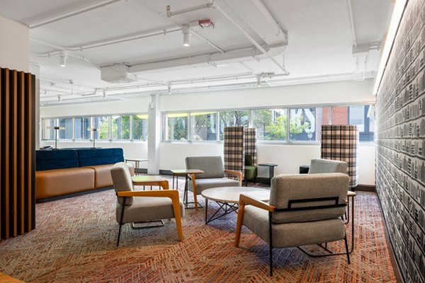 Clubhouse featuring modern design and social spaces at The Accolade on Chestnut Apartments