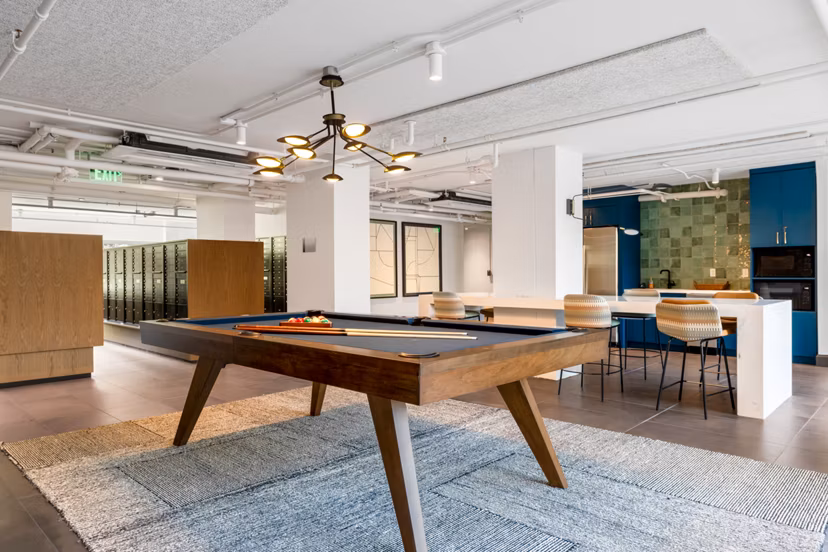 Clubhouse featuring modern design and comfortable seating at The Accolade on Chestnut Apartments Perfect space for gatherings and relaxation