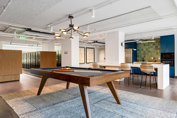 Clubhouse featuring modern design and comfortable seating at The Accolade on Chestnut Apartments Perfect space for gatherings and relaxation