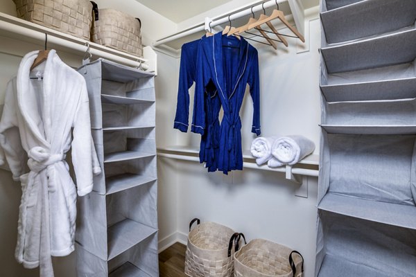 Cozy bedroom with modern decor and large windows at Azul Chula Vista Apartments, offering luxury living experience