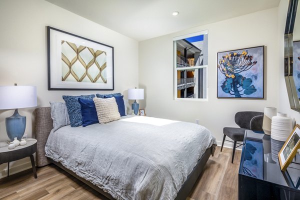 Cozy bedroom with modern decor at Azul Chula Vista Apartments: Luxury living in the heart of Chula Vista
