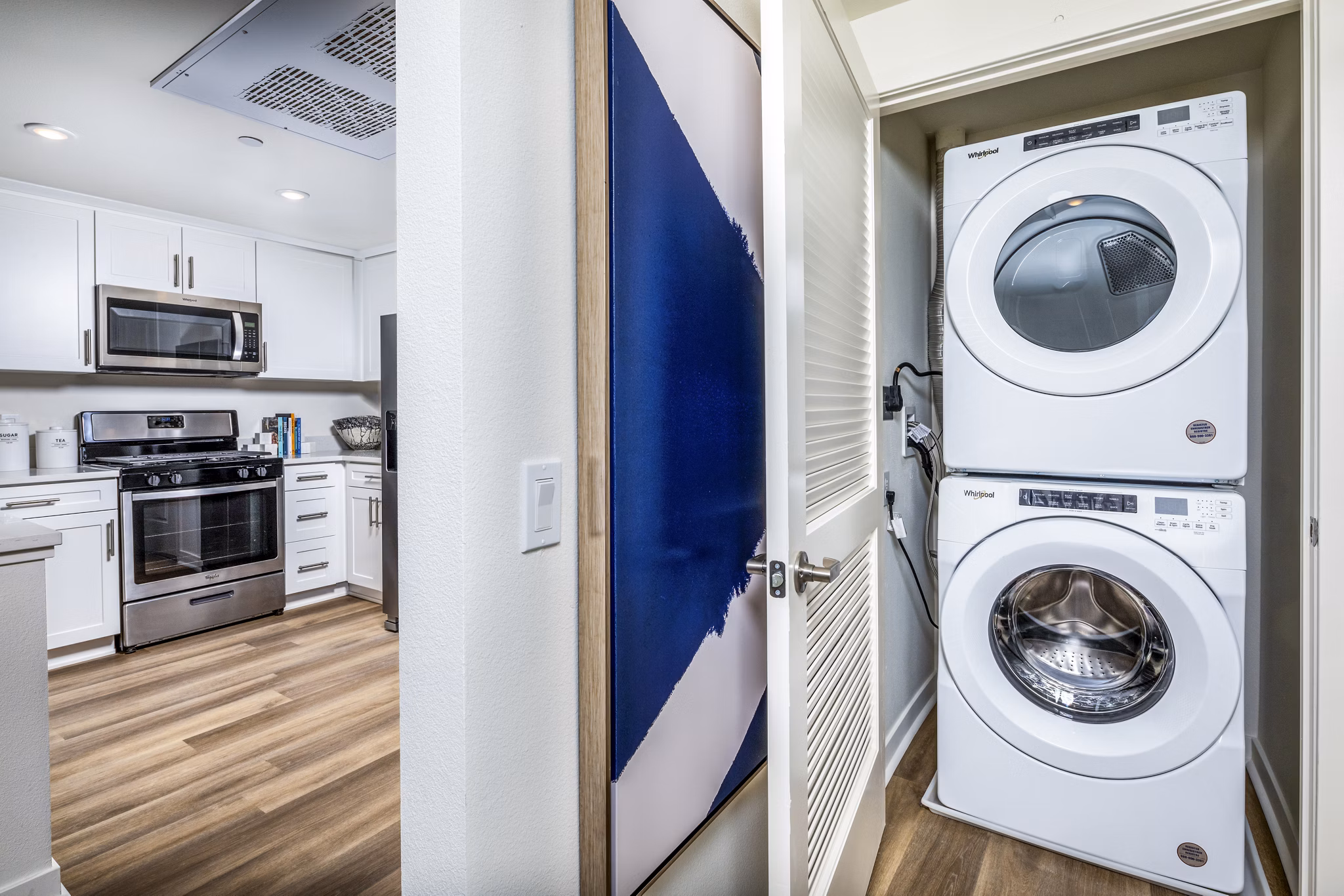 Laundry room with modern machines at Azul Chula Vista Apartments, providing convenient facilities for residents seeking luxury living