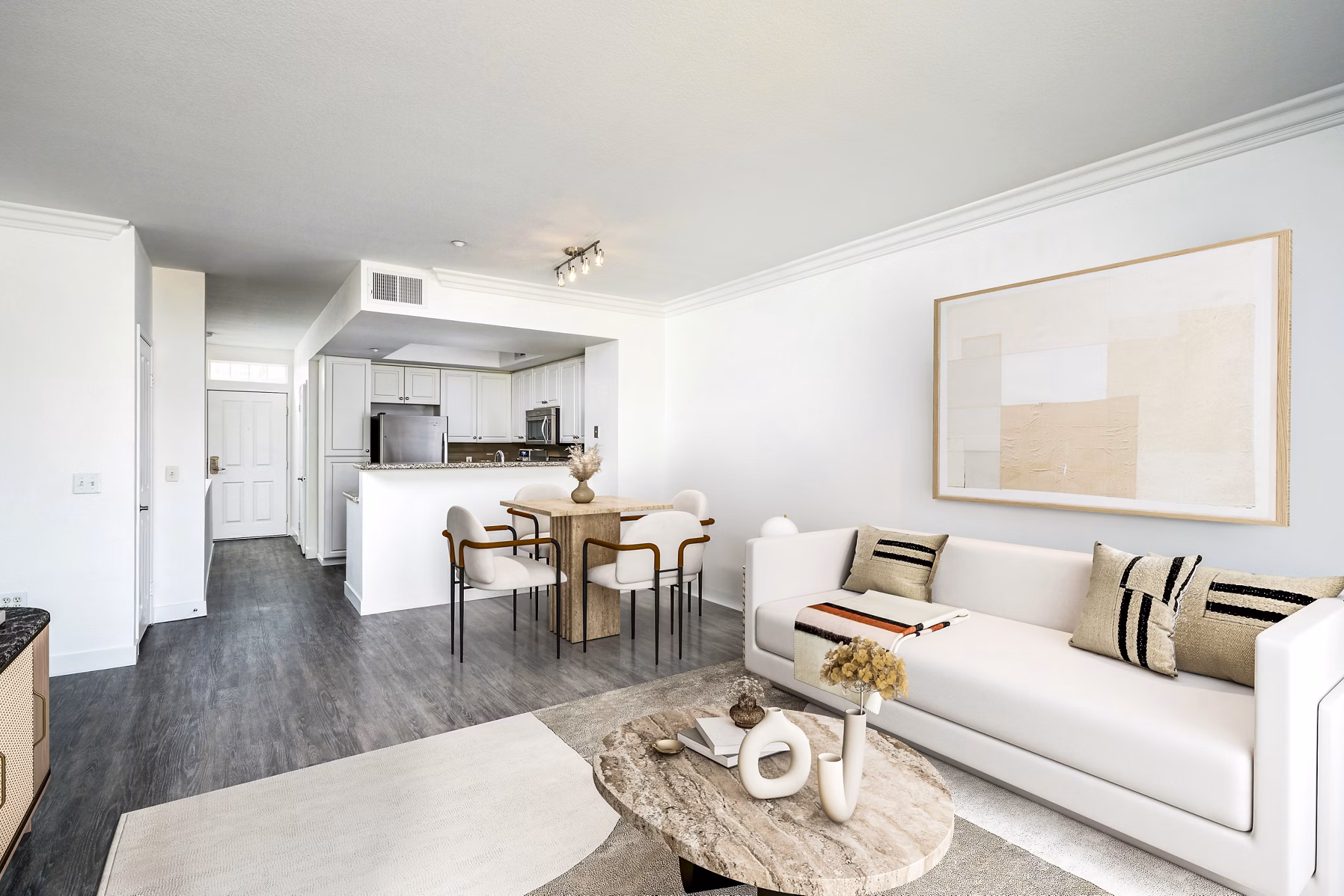 Contemporary living room with stylish furnishings at Gema Apartments, highlighting comfort and design
