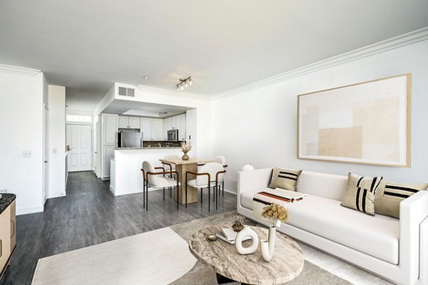 Contemporary living room with stylish furnishings at Gema Apartments, highlighting comfort and design