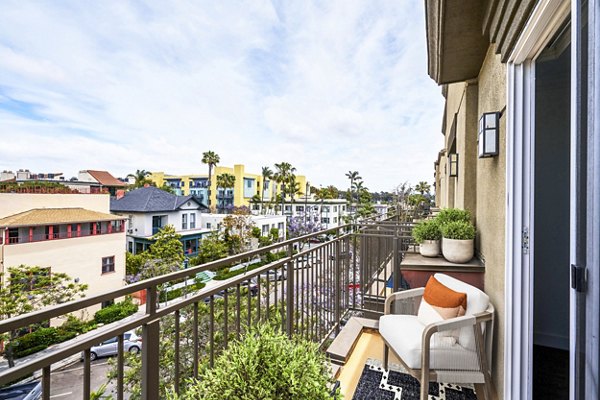 Gema Apartments: Private patio with modern seating and lush greenery