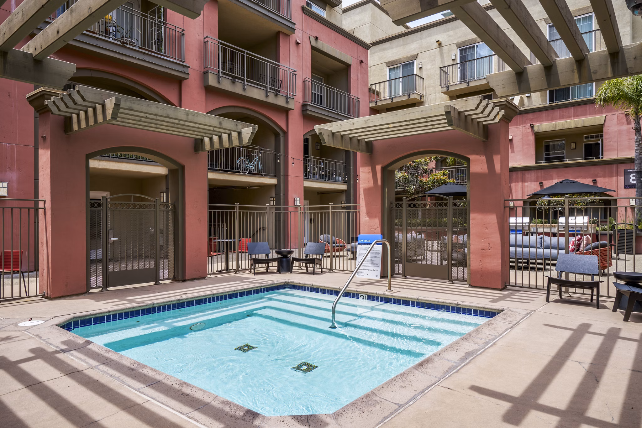 Gema Apartments: Luxurious hot tub adjacent to a modern terrace, offering relaxation in a serene atmosphere