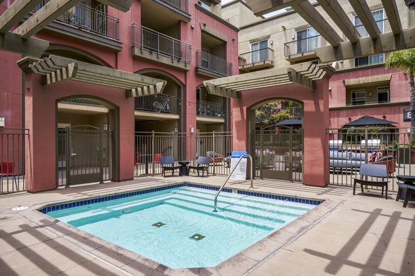Gema Apartments: Luxurious hot tub adjacent to a modern terrace, offering relaxation in a serene atmosphere