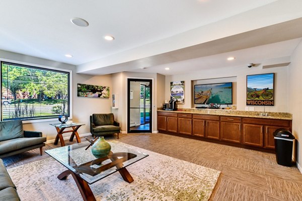 Modern clubhouse with sleek design at Sycamore Woods Apartments