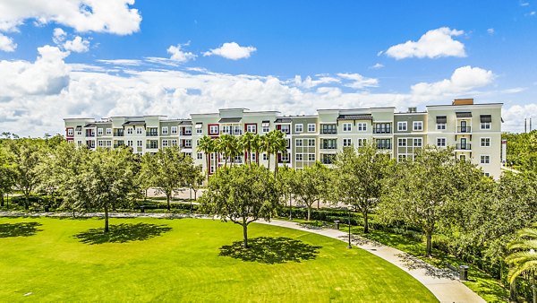Parkside at Avalon Park: Modern luxury apartments with lush landscaping in scenic setting