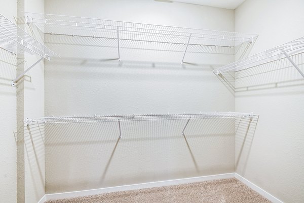 bedroom closet at Parkside at Avalon Park Apartments