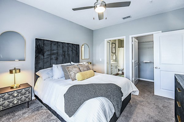 Cozy bedroom with elegant decor at Parkside at Avalon Park Apartments