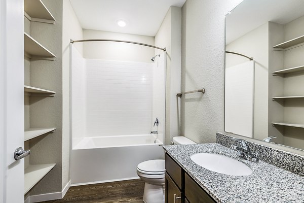 Modern bathroom with elegant fixtures at Parkside at Avalon Park Apartments