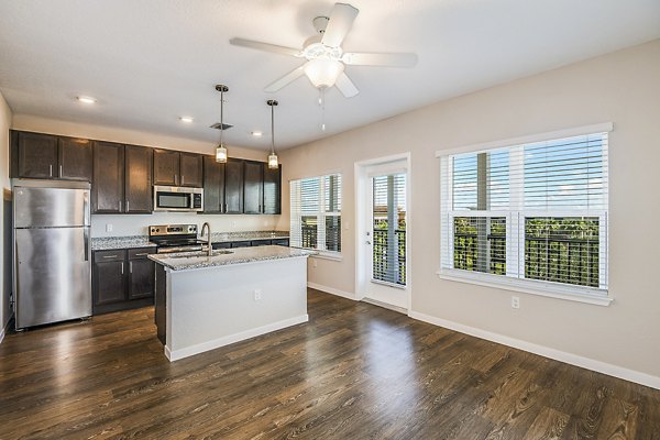 Elegant dining room with modern decor at Parkside at Avalon Park Apartments, showcasing luxury living