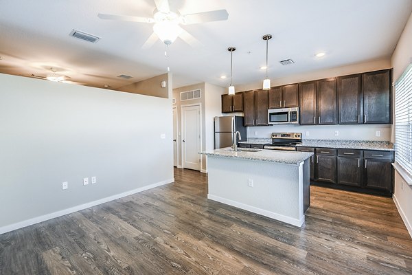 Elegant dining room with modern decor in Parkside at Avalon Park Apartments