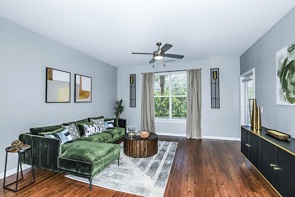Modern living room with elegant decor in Parkside at Avalon Park Apartments