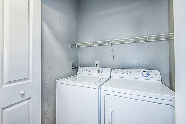 laundry room at Parkside at Avalon Park Apartments