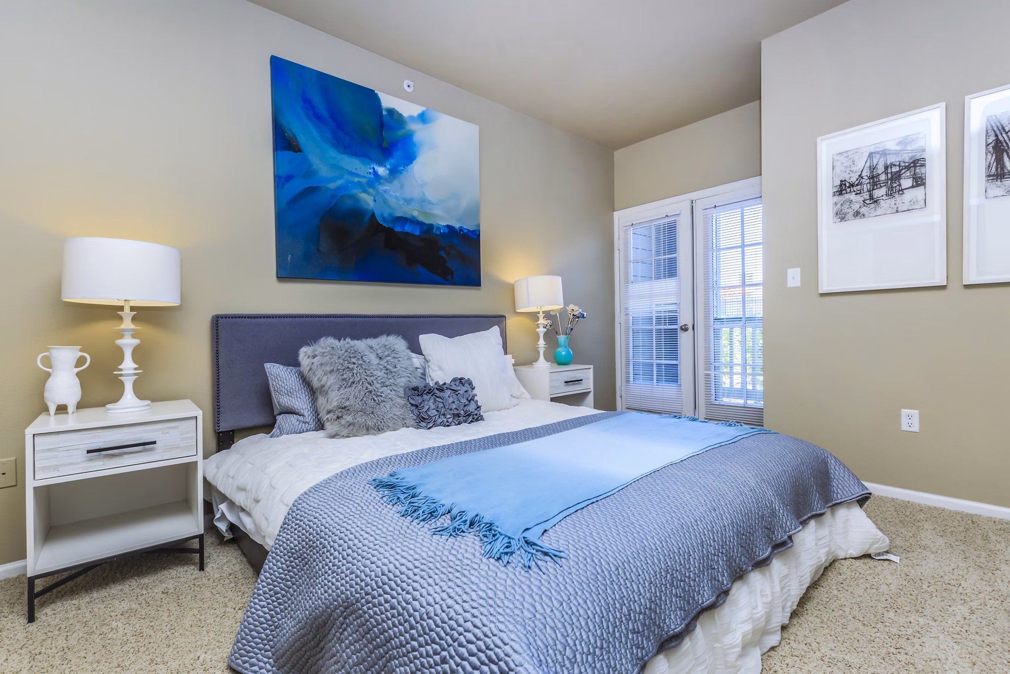 Bedroom featuring elegant design and plush bedding at Links at Legacy Ridge Apartments