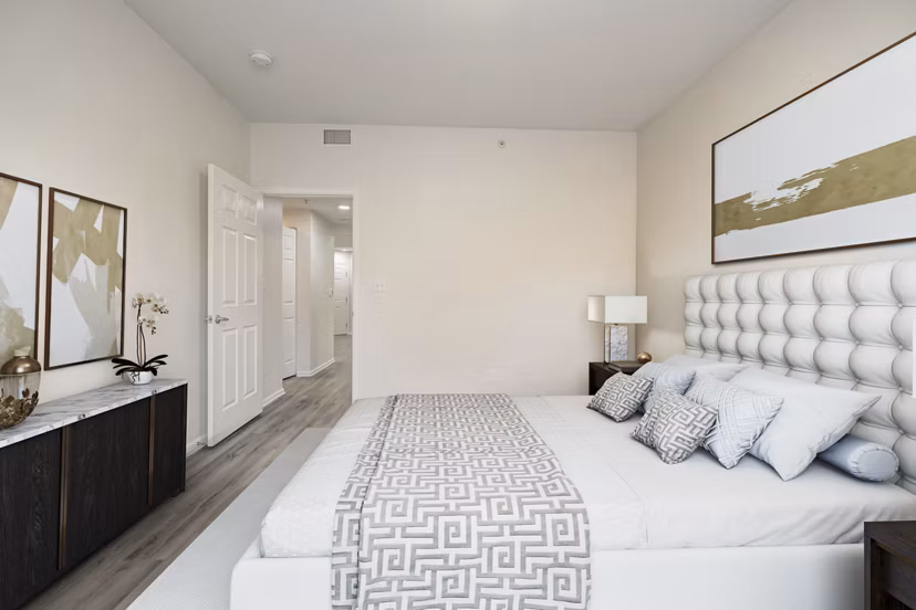 Cozy bedroom with elegant furnishings at Links at Legacy Ridge Apartments